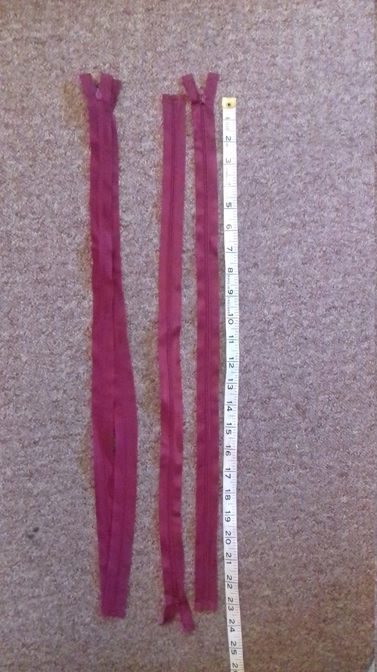 Raspberry red zip 23.5 inch (59.5cm) separating nylon open ended lighter fabrics