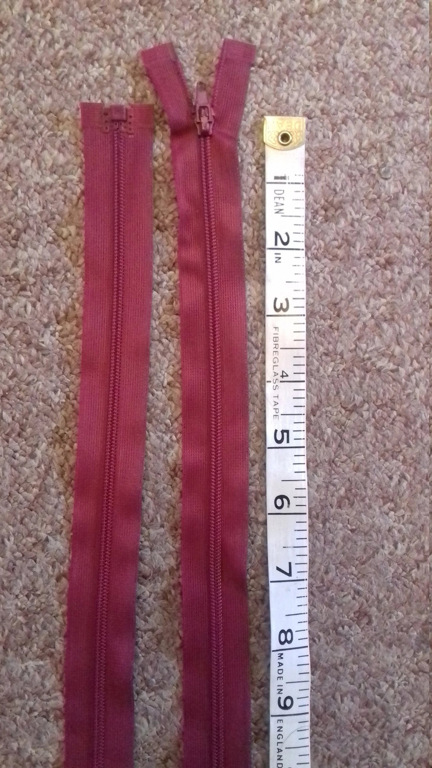 Raspberry red zip 23.5 inch (59.5cm) separating nylon open ended lighter fabrics