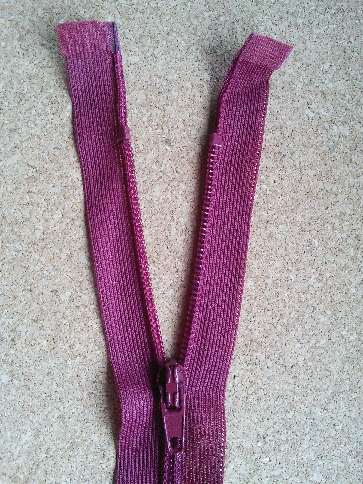Raspberry red zip 23.5 inch (59.5cm) separating nylon open ended lighter fabrics