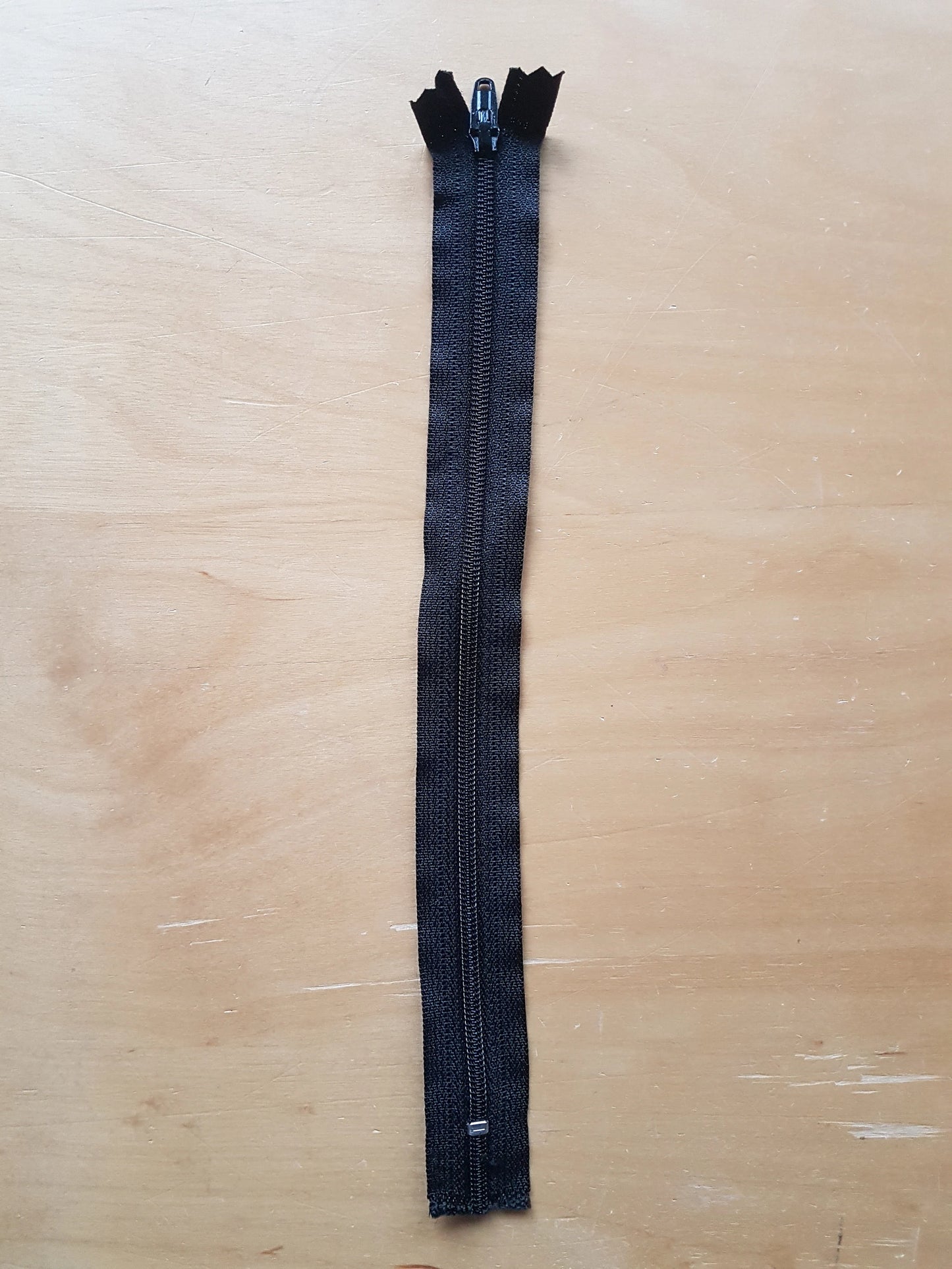 Black zipper plastic nylon 9 inch (22.5cm) closed end